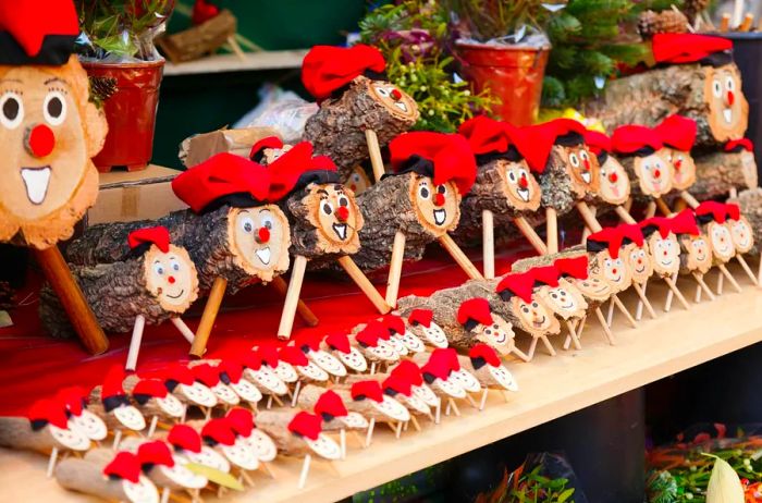 A display of wooden Tió de Nadal (Christmas logs), a character from Catalan mythology tied to a festive tradition.