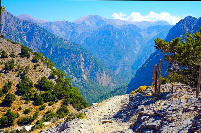 A hiking trail winds through the mountains surrounding Samaria Gorge, Crete, Greece