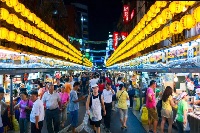 Keelung's bustling Miaokou night market is renowned across Taiwan for its incredible seafood offerings.