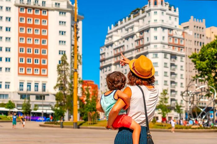 A mother and her son exploring the heart of Madrid