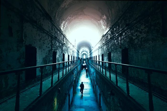 The now-abandoned Eastern State Penitentiary in Pennsylvania was once home to some truly terrifying real-life figures. windsketch/Shutterstock