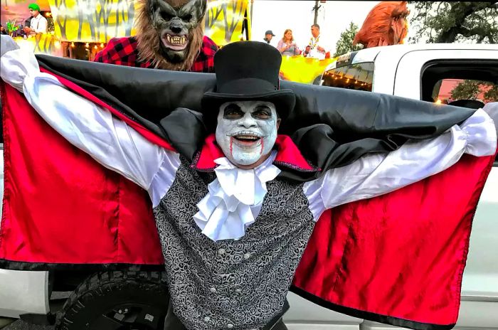 Prepare for thrilling celebrations infused with Mardi Gras flair at the Krewe of Boo! Halloween parade in New Orleans. Kathleen K. Parker/Shutterstock