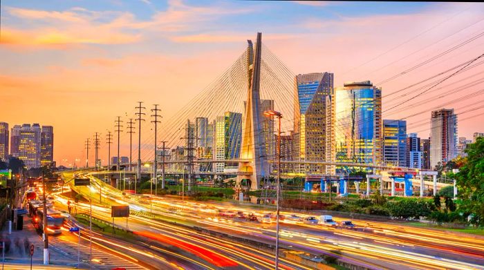 A bustling bridge filled with heavy traffic in a city