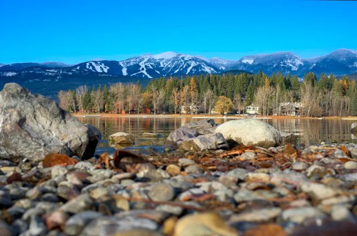 A stunning view of Whitefish Mountain Resort from the banks of Whitefish Lake in Whitefish, Montana.