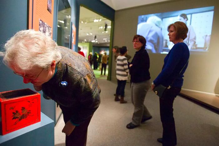 Visitors engage with an original exhibition,