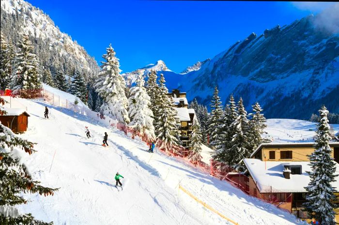 Skiers navigate the slopes in Villars-sur-Ollon