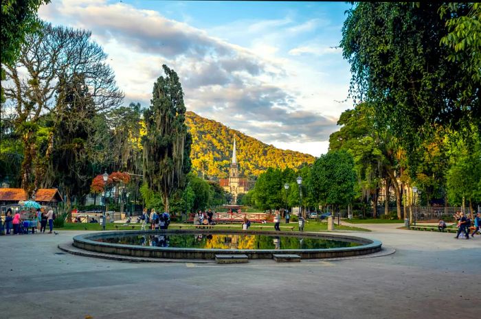 Visitors stroll through Praca da Liberdade Square in Petrópolis, Brazil.