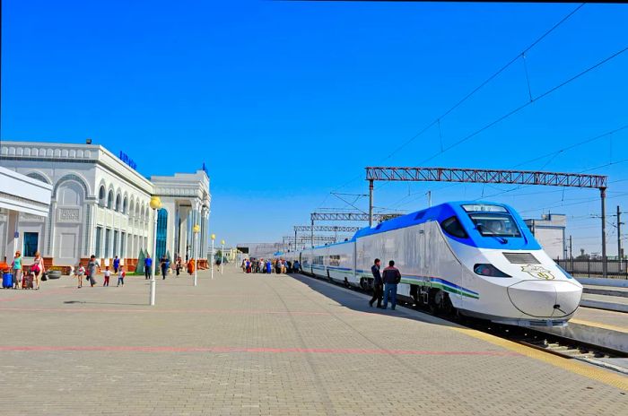 A high-speed train stands at the station