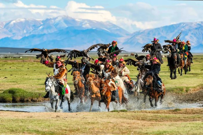 Kazakh hunters with their golden eagles in the Altai Mountains