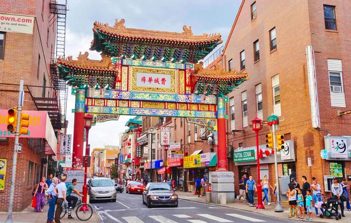 A wide-angle view of the intricate Chinatown Friendship Gate that marks the entrance to Chinatown in Philadelphia