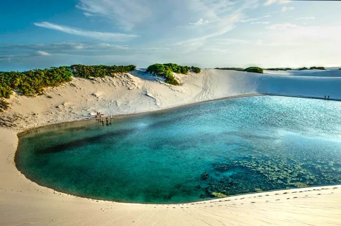 Lagoon amidst the dunes of Lençóis Maranhenses National Park, Brazil