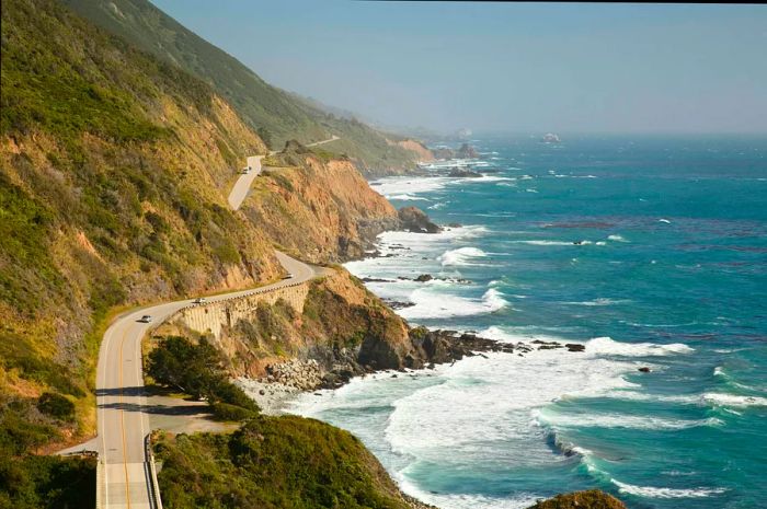 An evening view of the Pacific Coast Highway (also known as Highway 1) along Central California's Big Sur coastline.