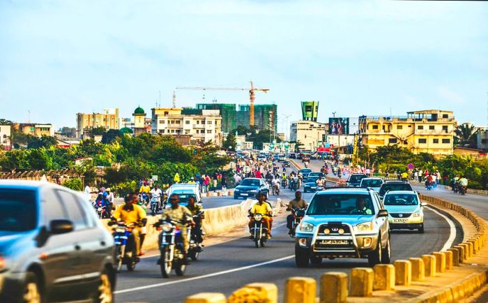 City traffic just before sunset in Cotonou