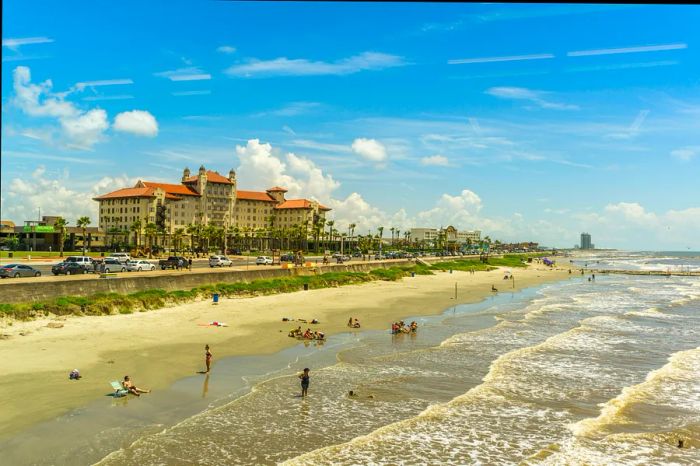 Sunbathers enjoying the sun on Galveston Beach in Texas