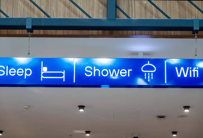 Inside Istanbul, Turkey, a sign at Sabiha Gökçen Airport (SAW) indicates Sleep, Shower, and Wifi services available.