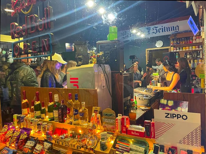 A glimpse through the window of a Späti in Berlin hosting a rave