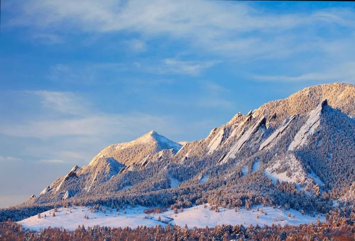 Stunning jagged mountains adorned with sharp, snow-covered peaks.