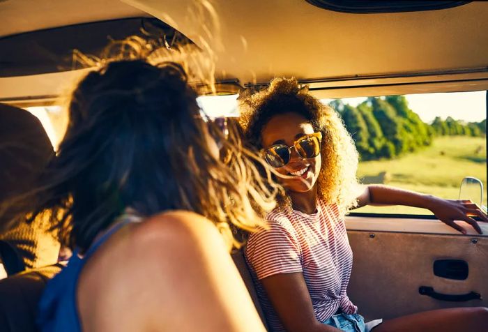 Two young women embark on a road trip together.