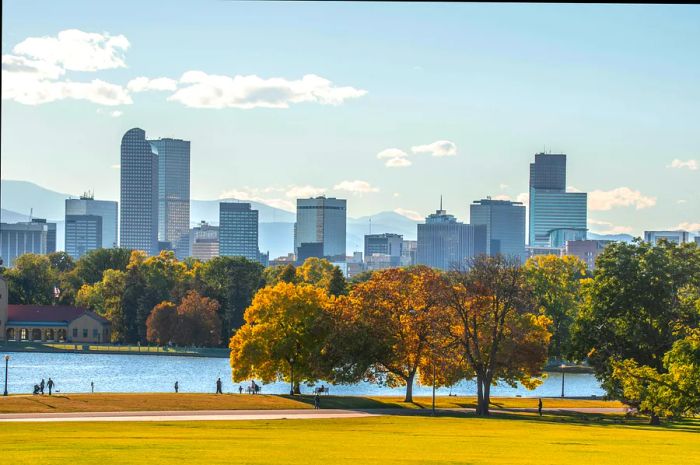 Autumn Foliage and Architecture in the City Beneath the Sky