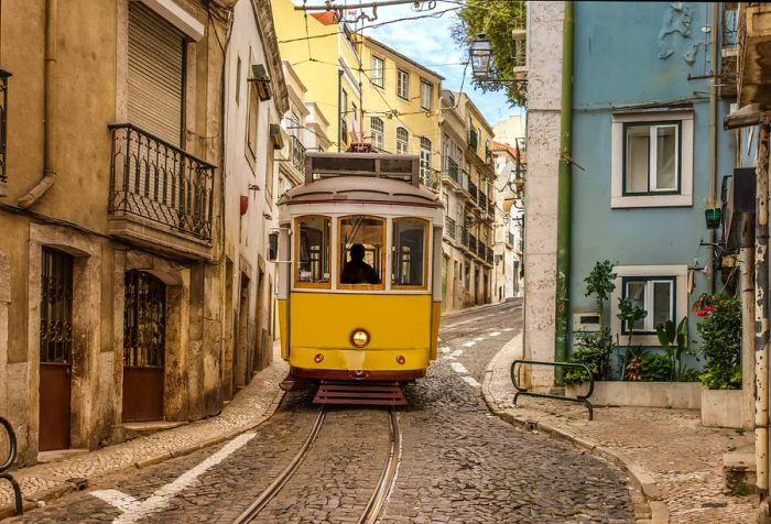 A charming vintage tram navigating through a narrow street lined with historic architecture.