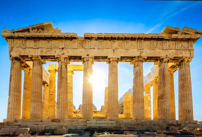 The ancient ruins of the Parthenon, illuminated by sunlight streaming through its majestic columns.