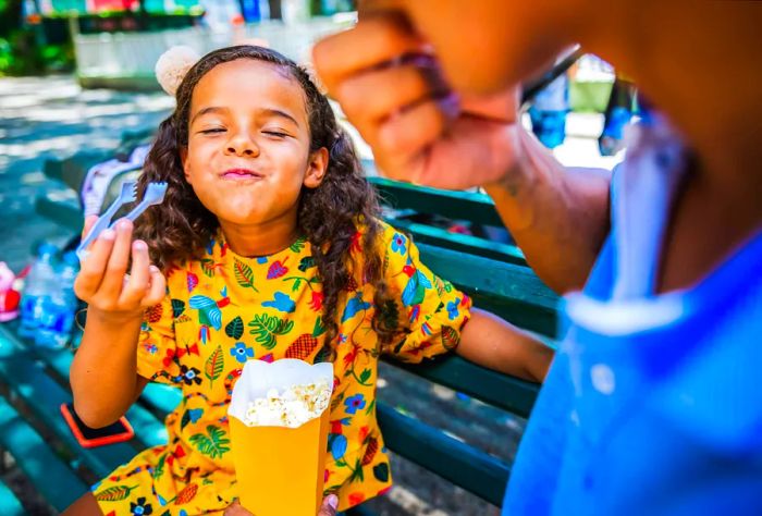 dest_brazil_family_girl_father_carnival_food_gettyimages-1213903016_universal_within-usage-period_81905