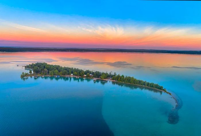 Treasure Island, Higgins Lake, Michigan, captured by drone at sunrise.