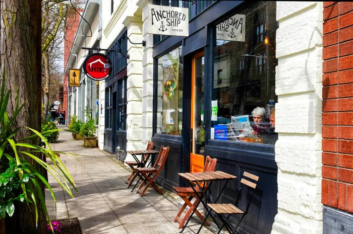 A cafe exterior featuring outdoor seating in the Ballard neighborhood of Seattle, Washington