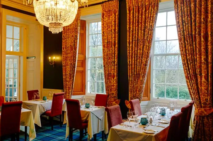 A dining area in a hotel nestled in the Scottish Highlands.