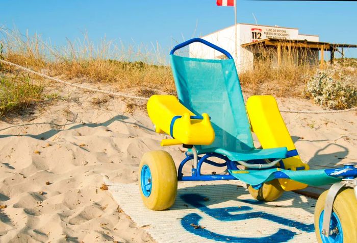 Wheelchairs for individuals with disabilities and a first aid station on the beach