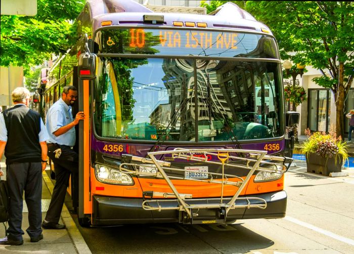 Passengers boarding an electric bus in Seattle