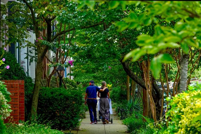 An older couple enjoys a leisurely walk in DC's Bloomingdale neighborhood