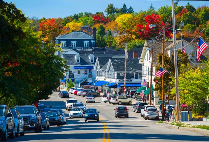 USA, New Hampshire, Lake Winnipesaukee Region, Wolfeboro, town traffic, fall.