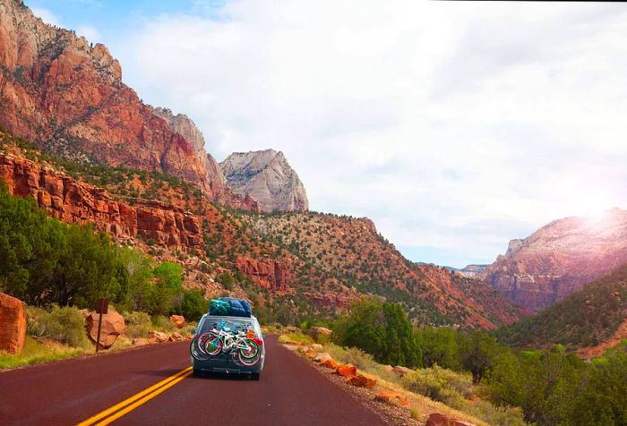 dest_usa_utah_theme_car_driving_mountains_roadtrip-gettyimages-586199646-scaled