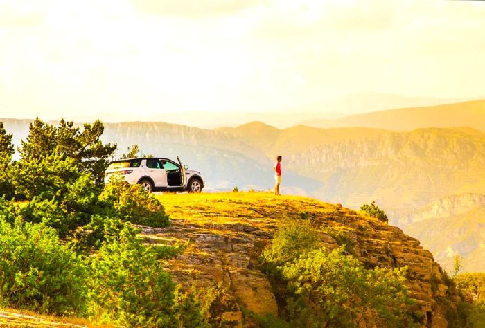 dest_spain_catalan-pyrenees_mountains_car_people_roadtrip_gettyimages-547075112_universal_within-usage-period_71762