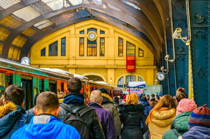 A bustling crowd at the train station in Piraeus, Greece