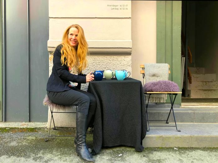 Master tea blender Hanne Charlotte Heggberget stands outside her atelier-boutique in Trondheim, Norway.