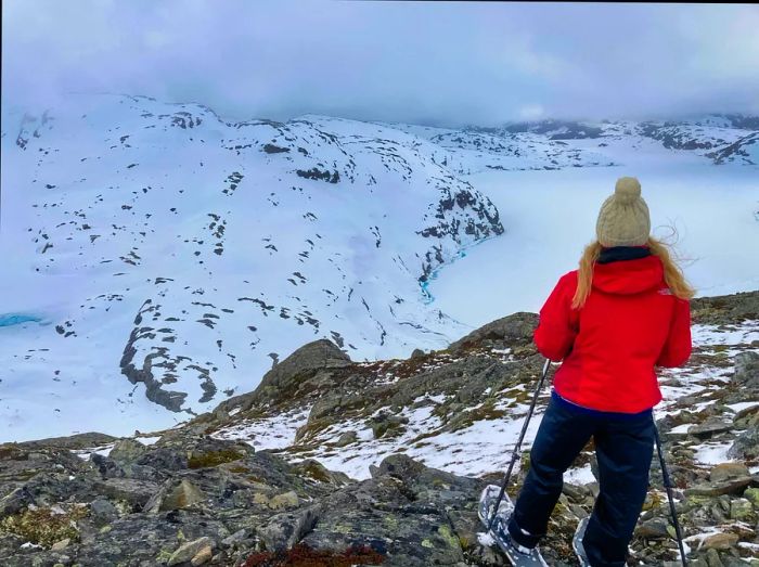 The author snowshoeing in Norway dressed in fleece gear