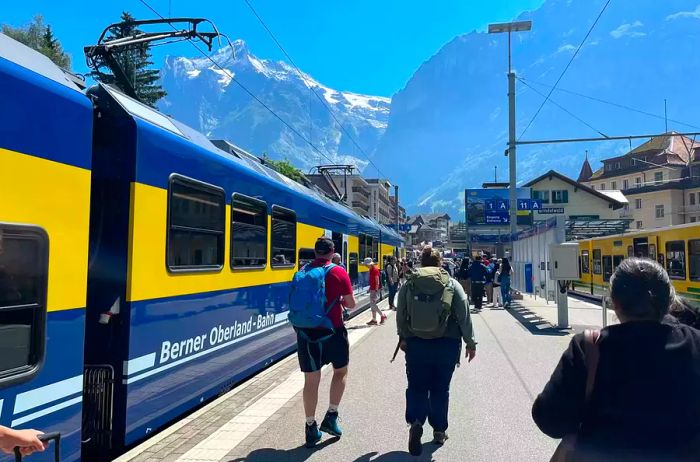 Walking along a train station platform in Grindelwald, Switzerland