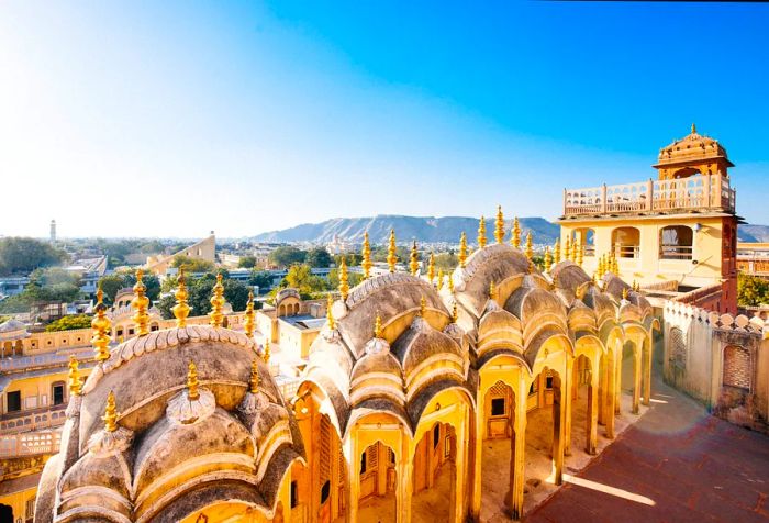 An architectural marvel featuring an intricate honeycomb facade and beautifully ornate windows.