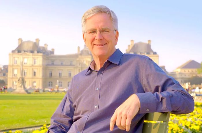 Rick Steves takes a pause from filming at the Louvre Museum in Paris, France