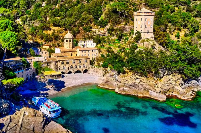 Aerial view of the San Fruttuoso abbey nestled on the Portofino promontory in Italy.