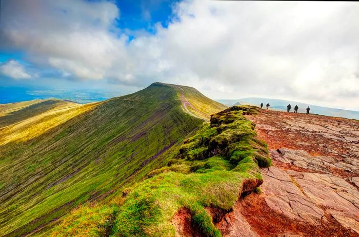 500px Photo ID: 82446203 - Hikers at the summit of Corn Du making their way towards Pen y Fan in the Brecon Beacons