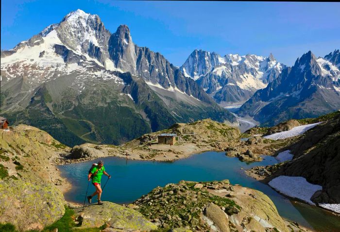 A hiker navigates rocky terrain near Lac Blanc, Chamonix, France