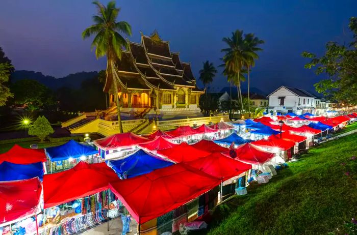 Night market and Haw Pha Bang temple in Luang Prabang