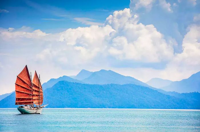 The Naga Pelangi, a classic wooden schooner, located near the Datai Langkawi resort.