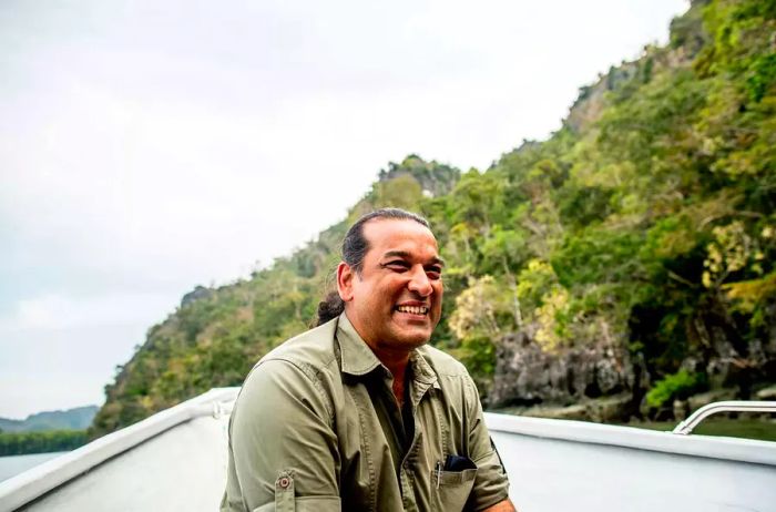 Irshad Mobarak, the resident naturalist at The Datai Langkawi, leading a boat tour.