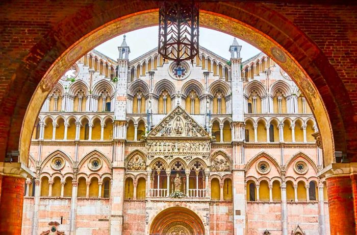 An intricately detailed facade of an ancient cathedral