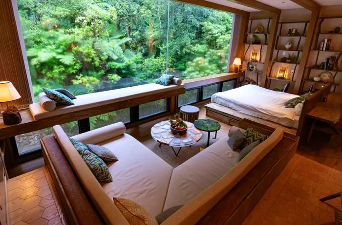 Living room interior of a treehouse at Treeful Treehouse Sustainable Resort.