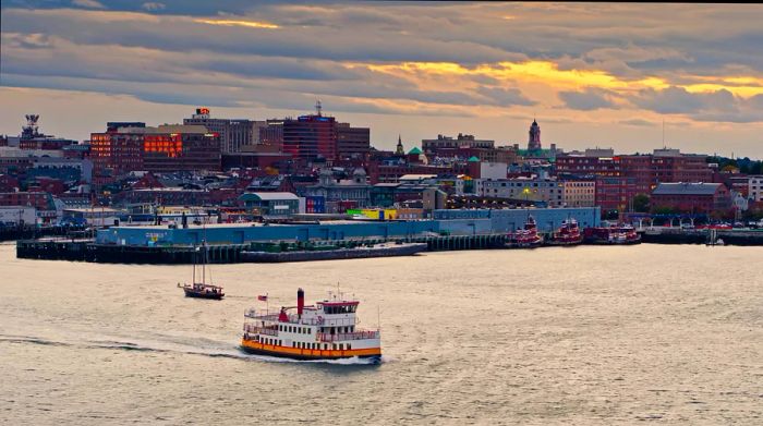 Aerial view of Old Harbor and the Waterfront districts in Portland, Maine, during sunset.